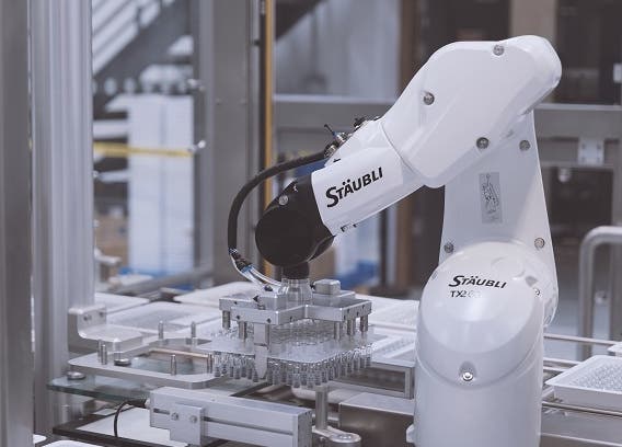 A flexible robotic cell handles end-of-line inspection, labelling and palletizing of 36,000 syringes per hour.