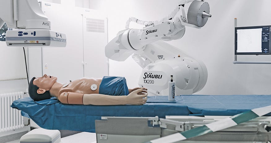 Robot-assisted automation in oncology: magnetic drug targeting using a TX200 six-axis robot.