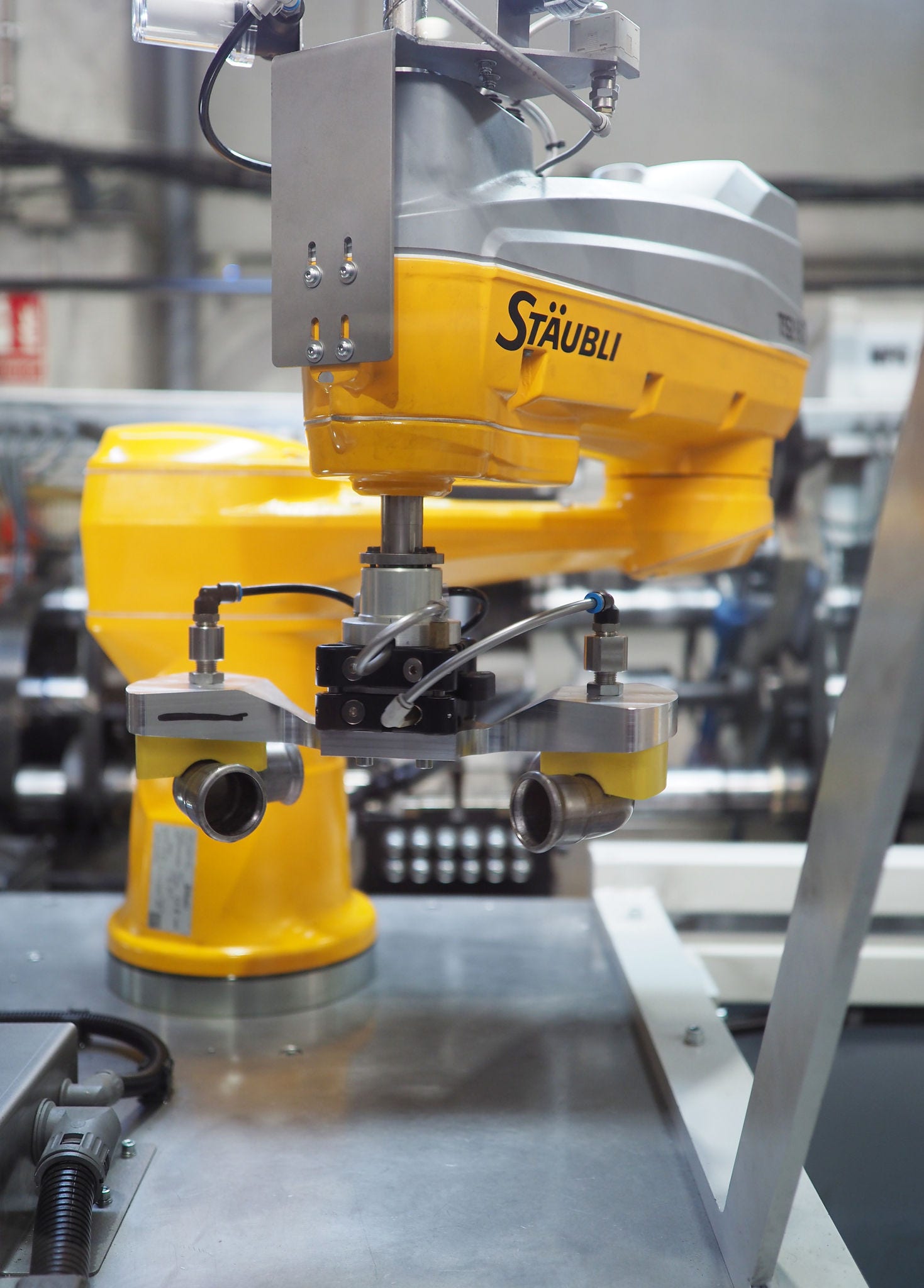 Robot-assisted shaping and inspection of press fittings