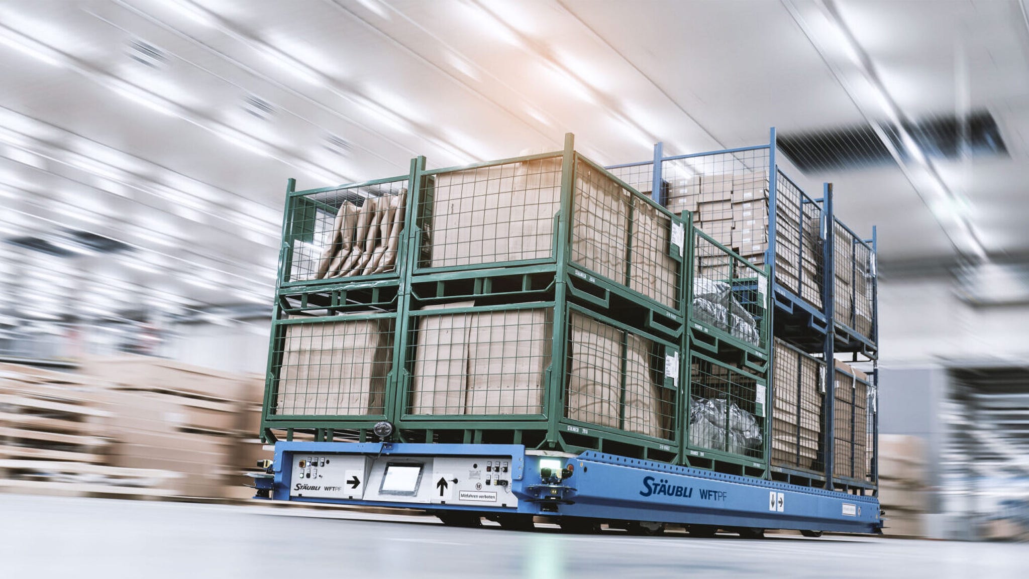 Multi-pallet transport AGV streamlines the material flow.