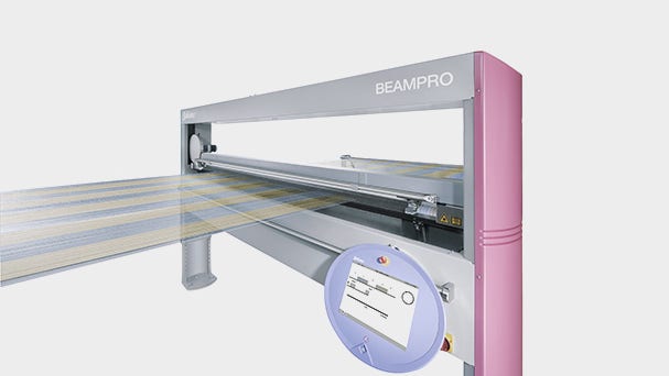 BEAMPRO automatic reading-in machine for sorting coloured yarns on sizing machines prior to weaving.