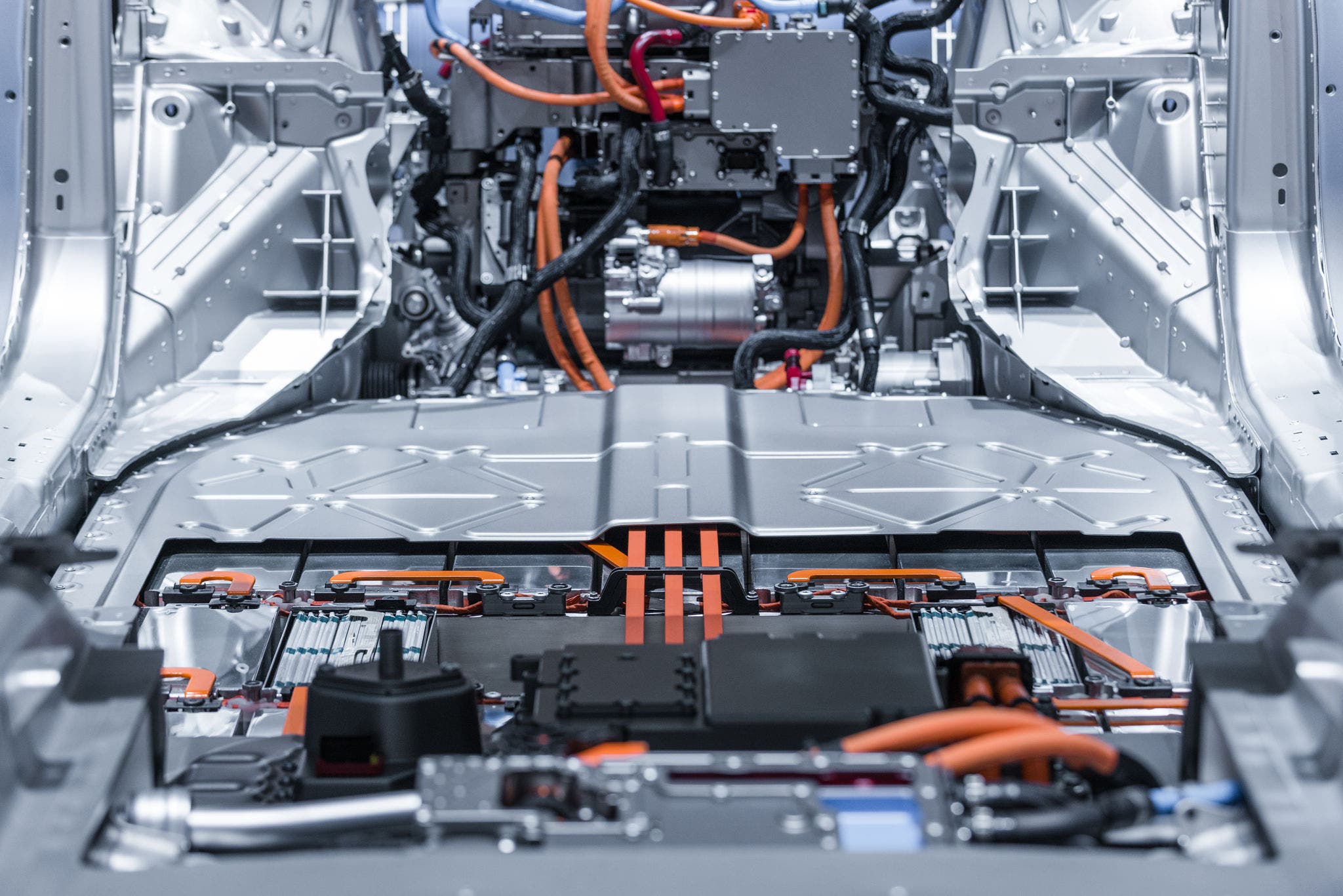 Battery and electrical wiring system inside an electric vehicle, showcasing advanced engineering and technology.