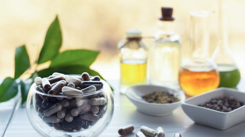 Capsules with dietary supplements. Ingredients for making food supplements, tinctures, oils, herbs; Shutterstock ID 1690320109; purchase_order: Sabrina Zeitler