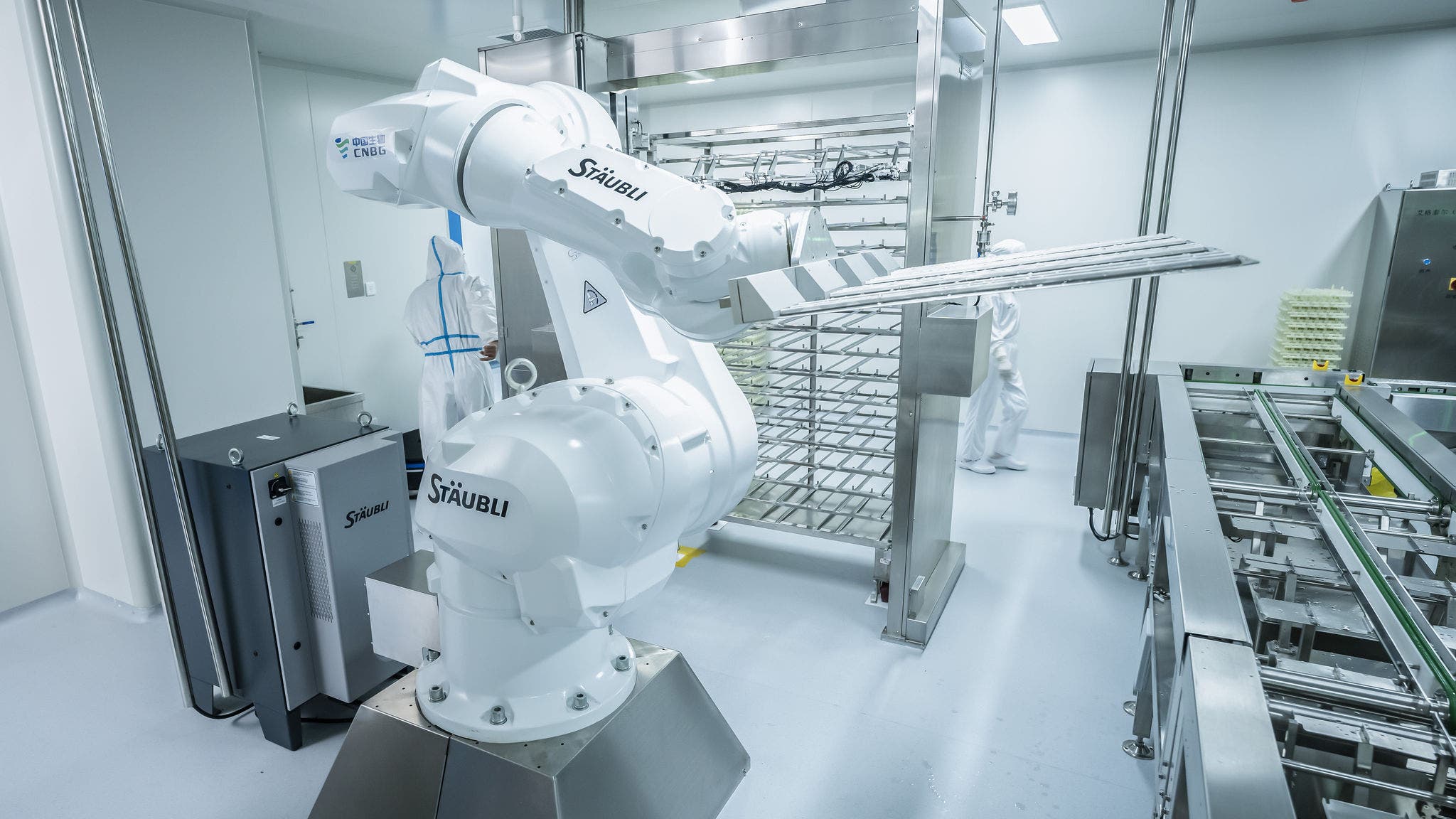 robots assist in handling, transferring and screening the inoculated eggs