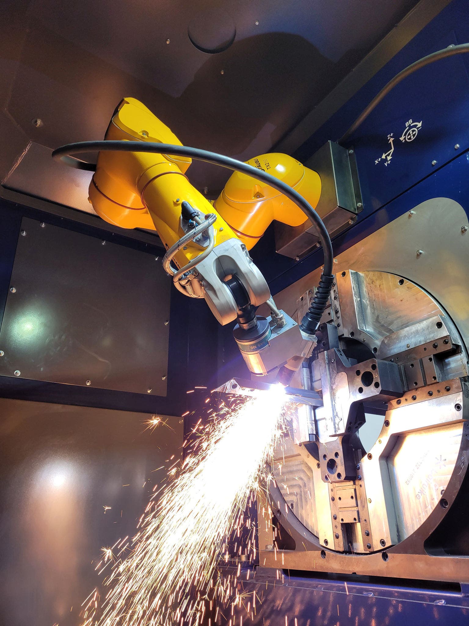Plasma cutting machine with TX2-60L and external axis