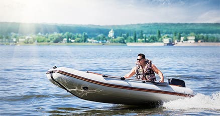 Inflatable boat with lightweight hulls
