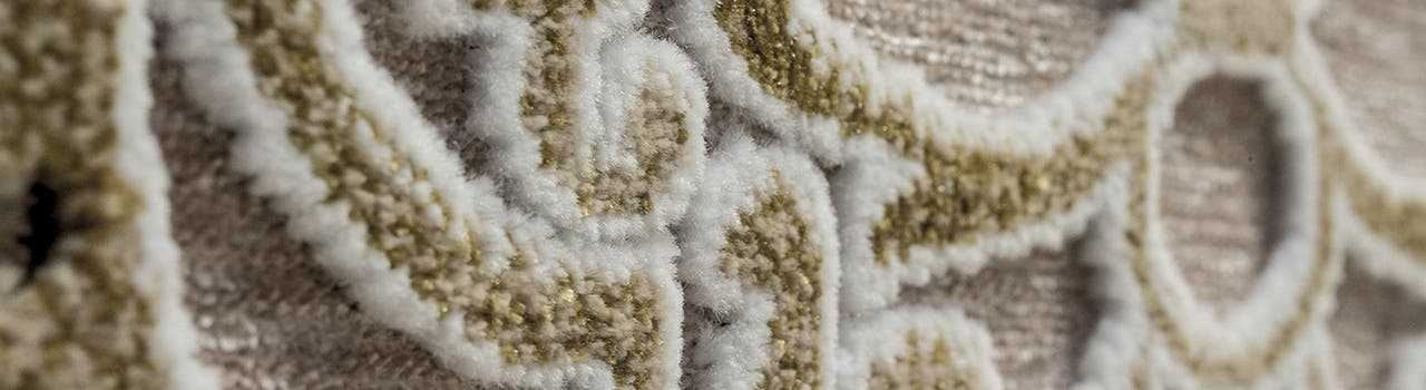 Cutpile carpet sample woven on ALPHA 500 series carpet weaving machines.