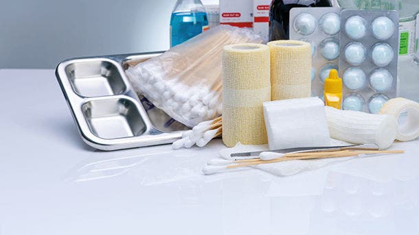Wound care dressing set and stainless steel plate, forceps, cotton stick, conform bandage, elastic cohesive retention bandage, povidone-iodine, cotton ball with alcohol. Medical equipment for nurse.; Shutterstock ID 2018022332; purchase_order: cyrille guerin
