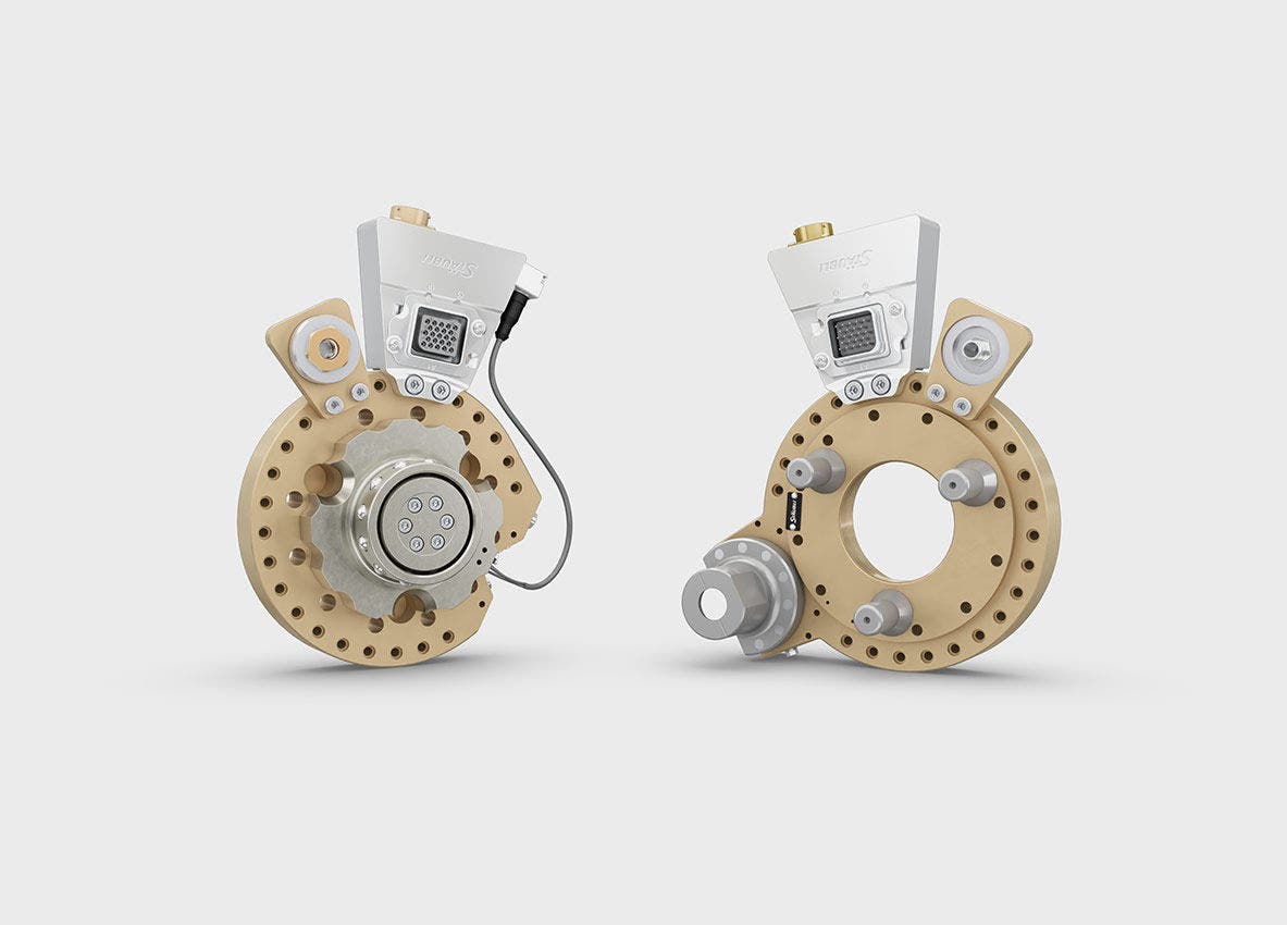 Two robotic tool-changing units with beige circular bases, featuring multiple connectors and adapters, designed for integration in automated systems with Staubli branding.