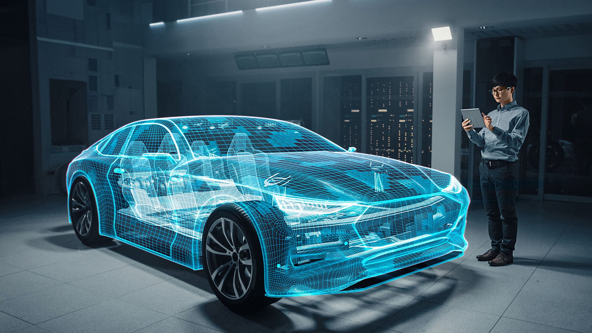 Automotive Engineer Working on Electric Car Chassis Platform, Using Tablet Computer with Augmented Reality 3D Software. Futuristic Atomative Facility: Virtual Design with Mixed Technology Application.; Shutterstock ID 1570892662; purchase_order: Patrik Gloor