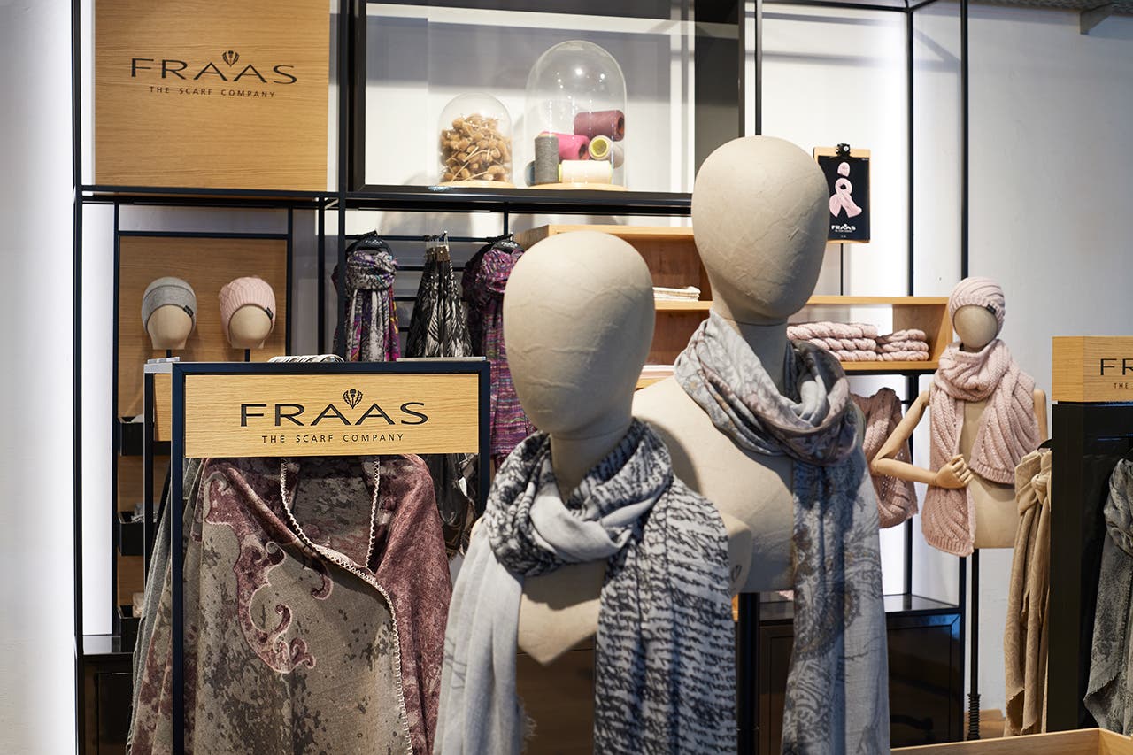 Showroom with scarves displayed from a dummy photographed at Fraas shooting 2016.