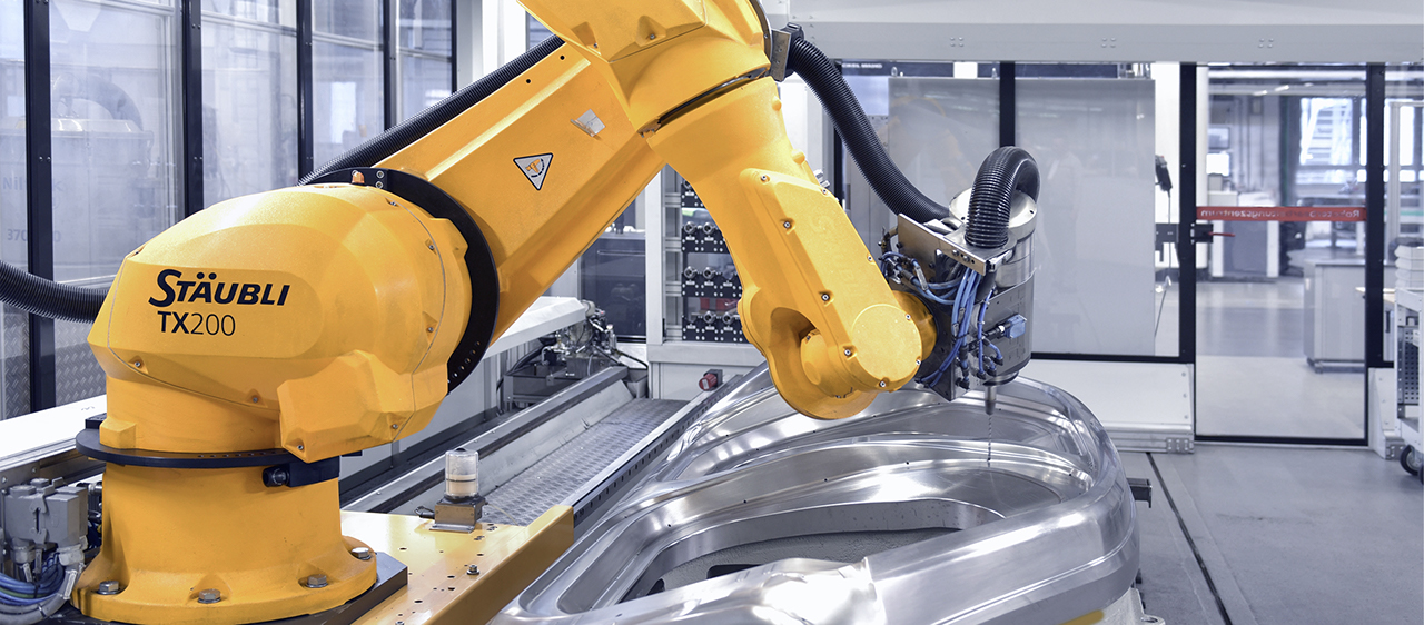Robot-assisted machining of molds with TX200