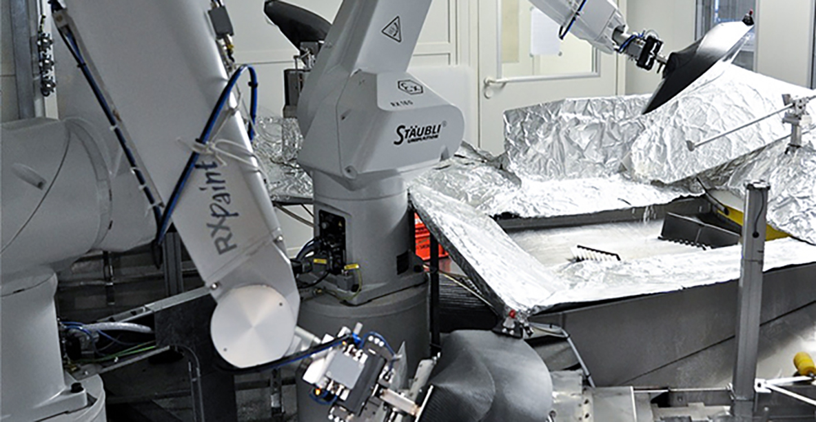 In the coating system two Stäubli-painting robots type RX160 paint work together on tightest space.