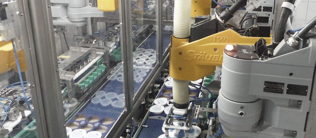 Four TS60 SCARA robots for packaging palletizing of yogurts application