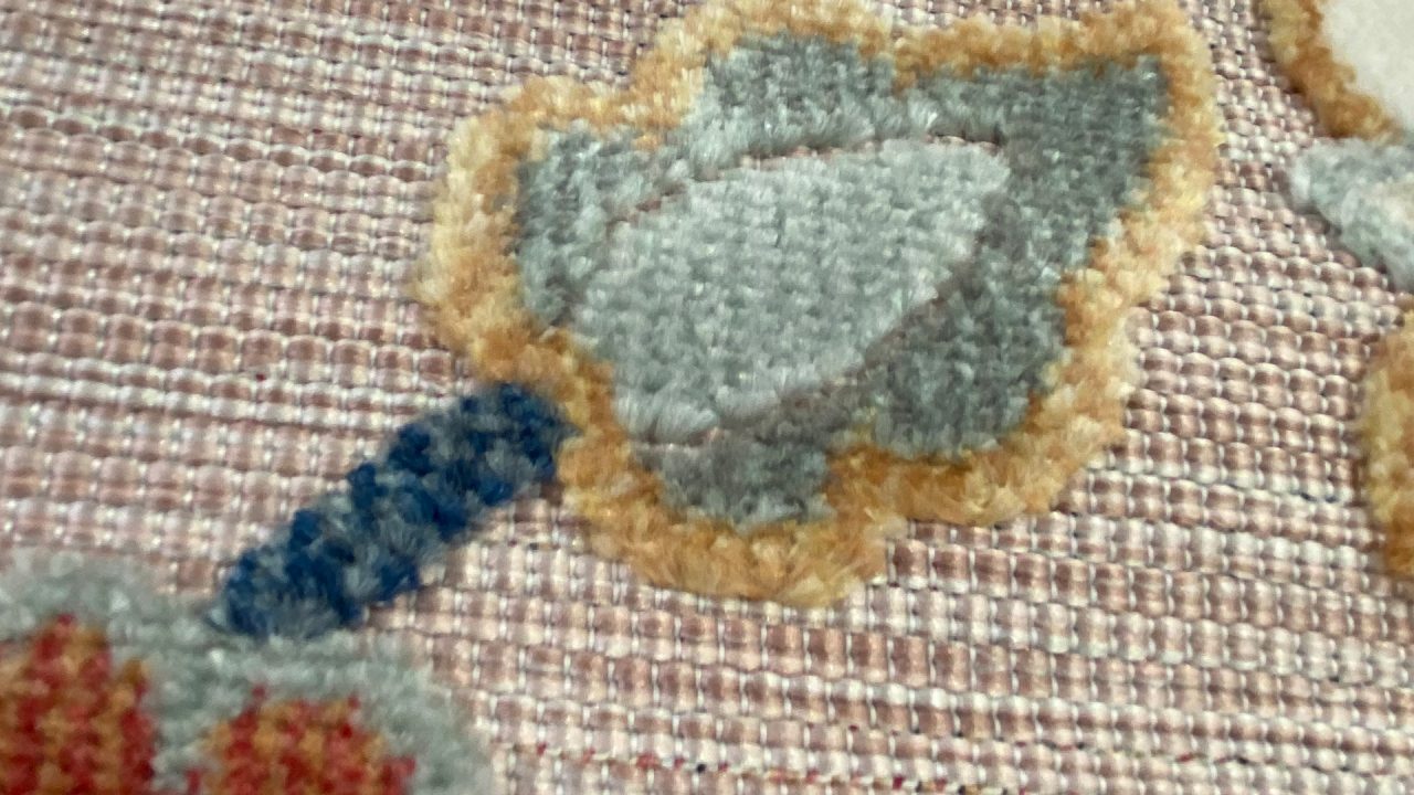 Cut pile with weft patterning and special ground weave structure produced on the ALPHA 560 UNIVERSAL weaving machine