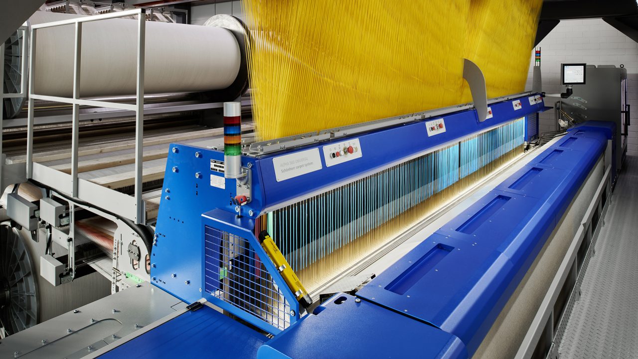 The Stäubli ALPHA carpet weaving machine allows weaving reversible carpets with different designs on the front and back side.
